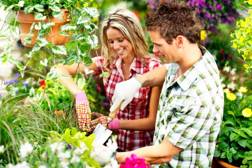 Inspector examining plants and work details